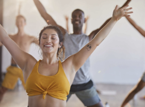 Women doing yoga at a gym class