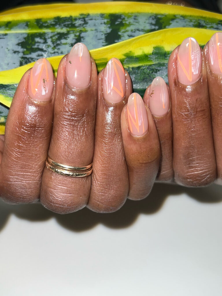 showcasing nail designs on a hand